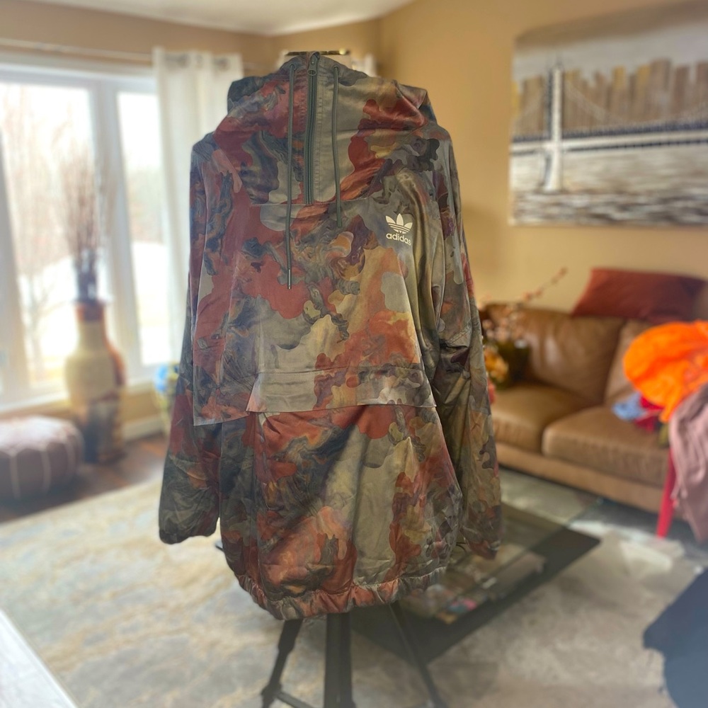 Adidas pull-over exclusive jacket.